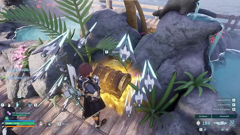 Opening a glowing golden treasure chest at an enemy base in Palworld 1.0